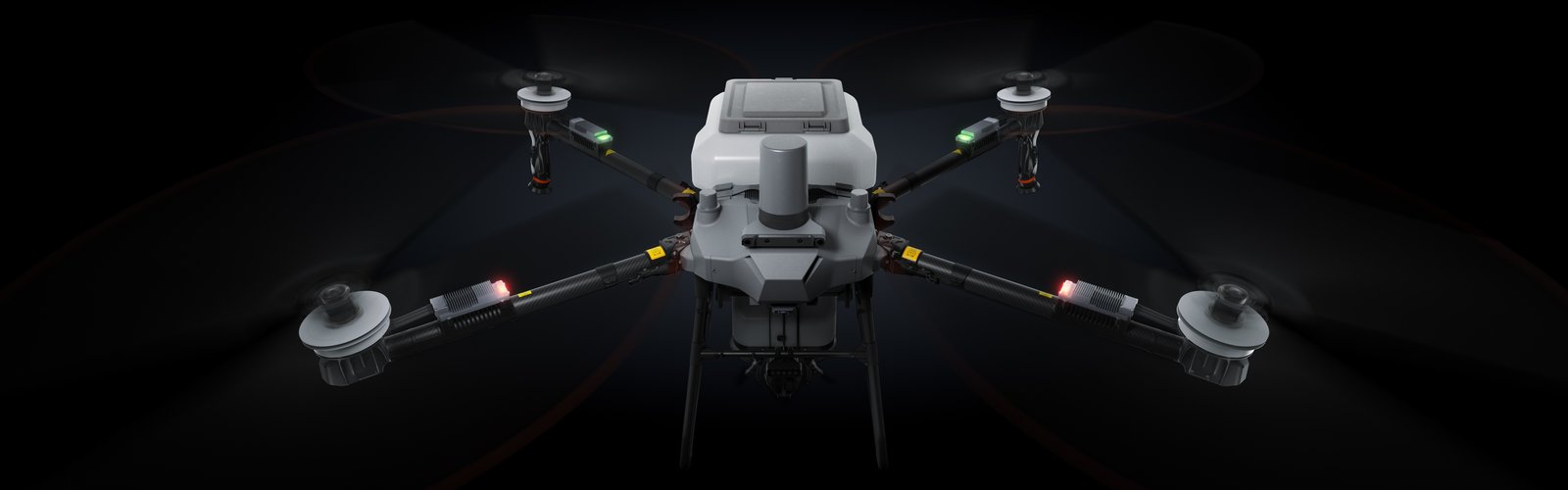 Dron agrícola DJI Agras T70P visto de frente, con el depósito de pulverización